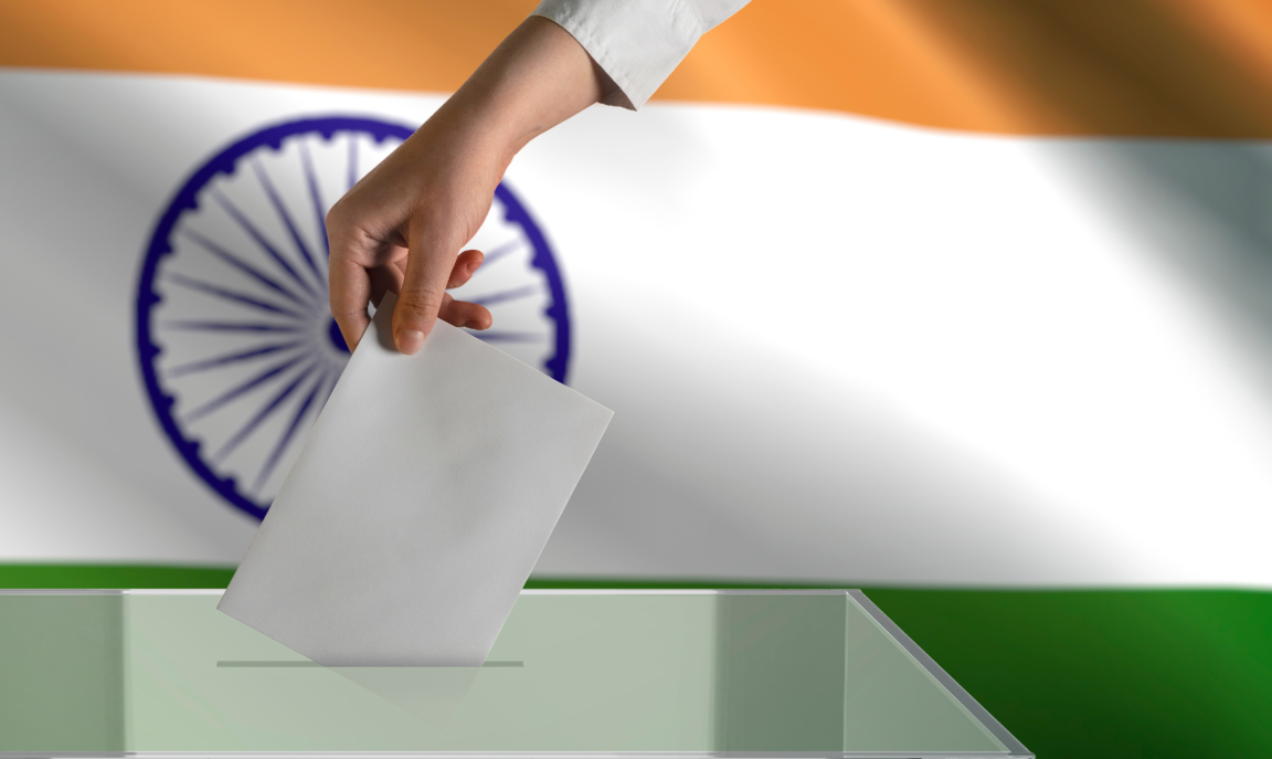 Image of ballot box and and flag of India  © Canva